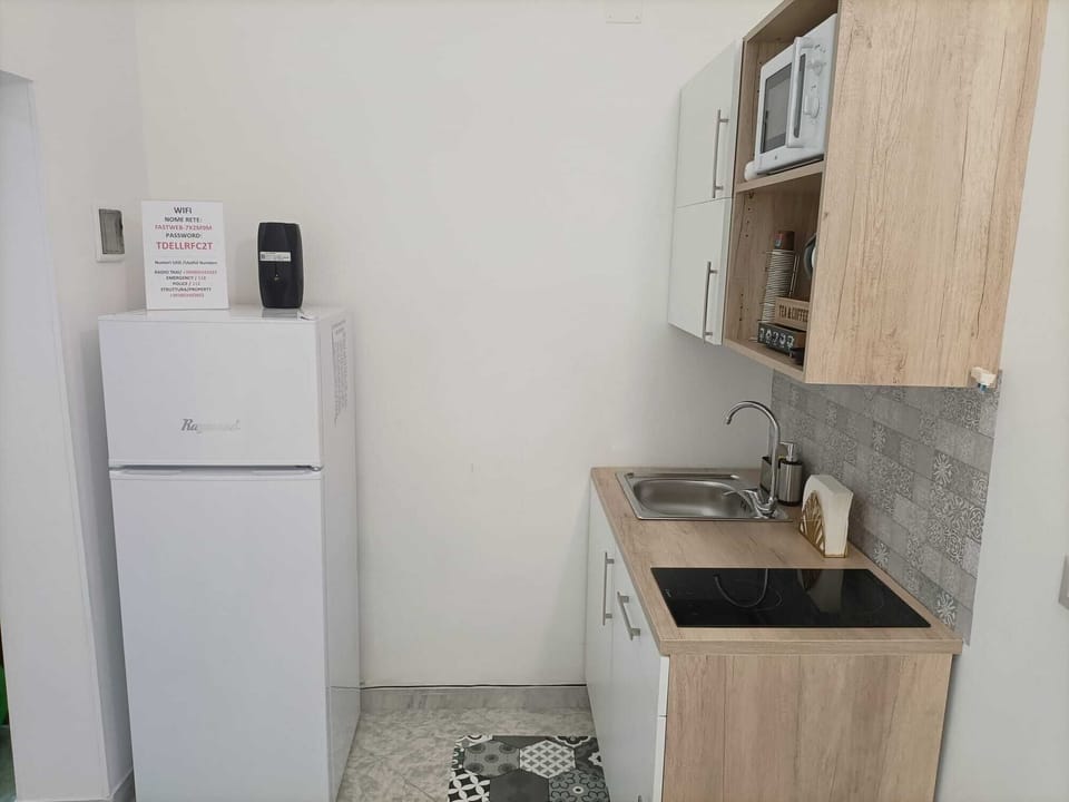 Comfort Apartment | Private kitchen | Full-size fridge, microwave, stovetop, electric kettle