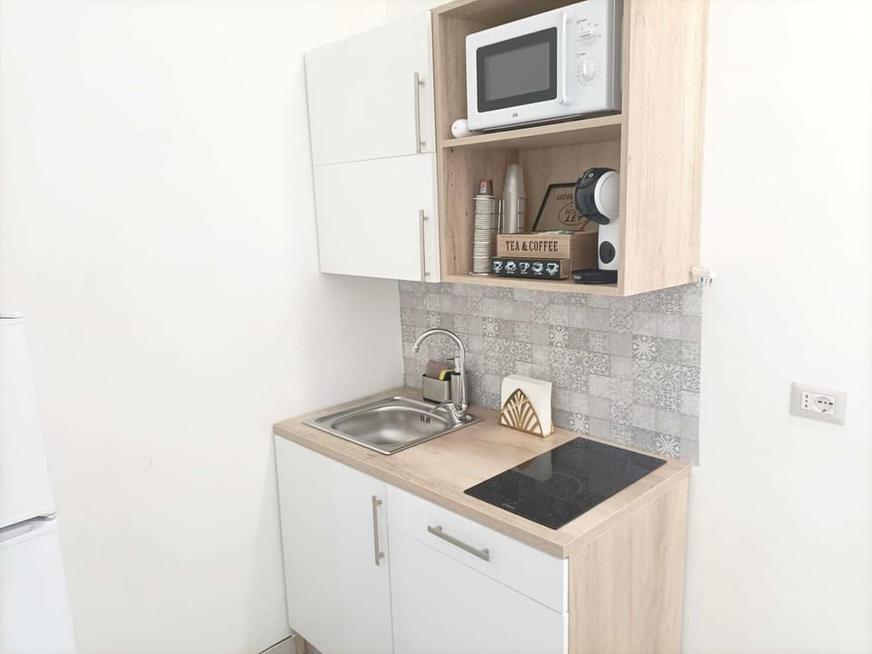 Comfort Apartment | Private kitchen | Full-size fridge, microwave, stovetop, electric kettle