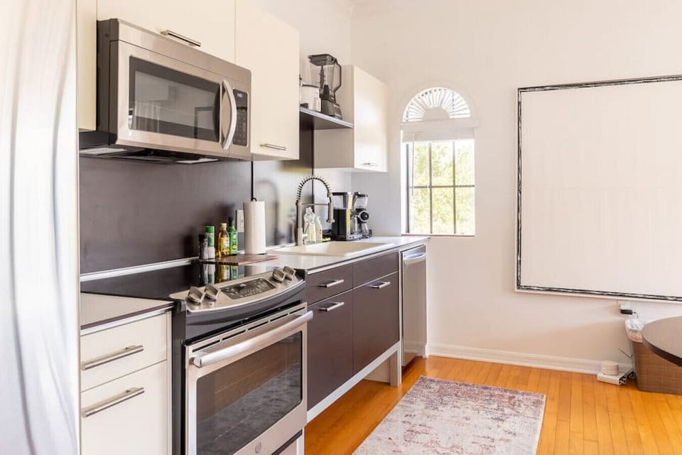 Full kitchen with brand new appliances and coffee maker.