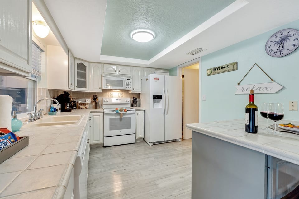 Immerse yourself in a kitchen that is not just fully equipped but is a visual delight.