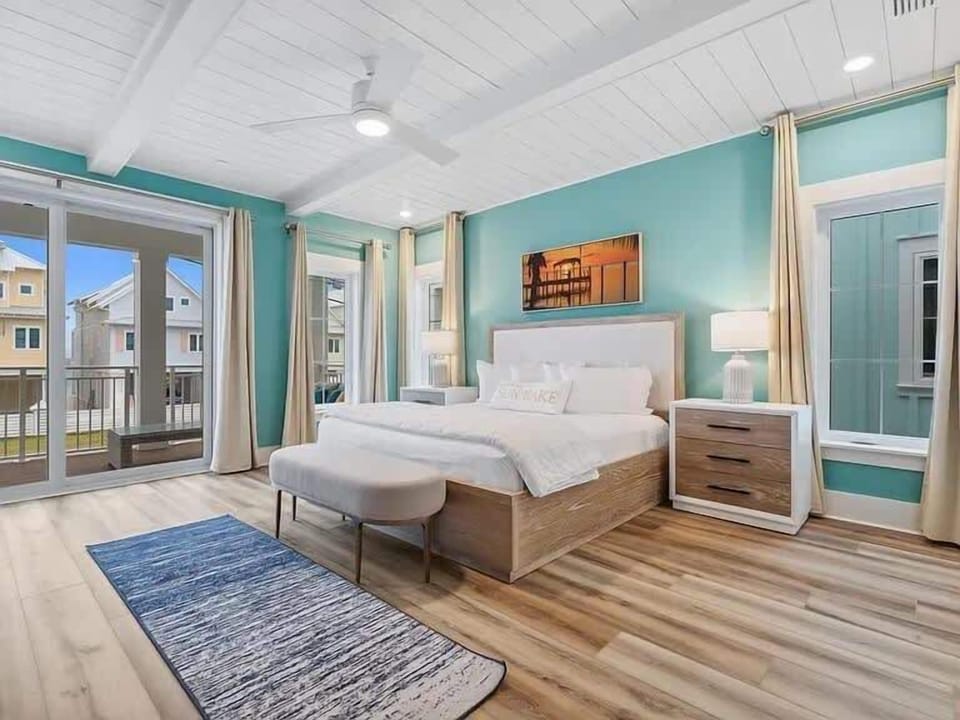 Our 2nd Floor Master will put you in the 5 O Clock Somewhere state of mind with tons of space and a luxurious king sized bed. Enjoy the private balcony or watch a movie from our living room sized TV. This master has a en suite bath room and closets.