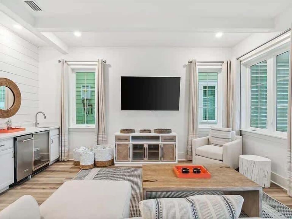 Come enjoy the 5 O Clock Somewhere state of mind in our spacious living room equipped with a wet-bar and Margaritaville concoction maker. This space is perfect for the whole family to relax together and comes with an ice-maker and mini-fridge.