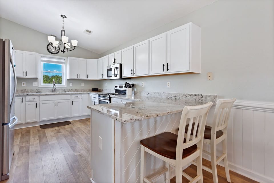 Whip up something delicious in the Kitchen with granite countertops and stainless steel appliances.