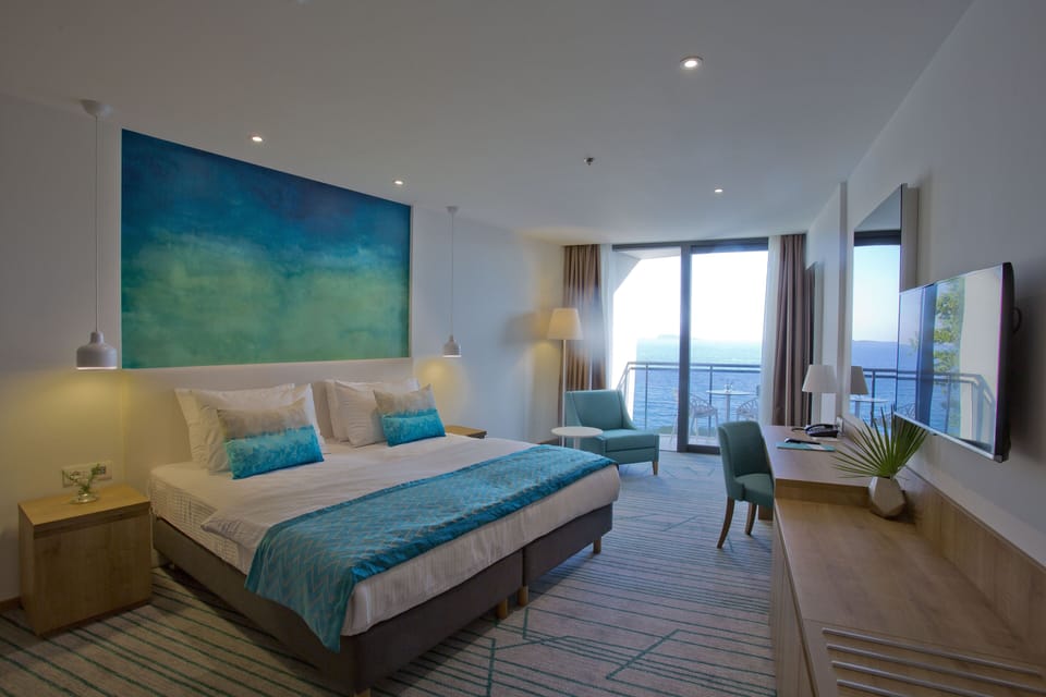 Superior Double or Twin Room, Balcony, Partial Sea View | Minibar, in-room safe, desk, soundproofing