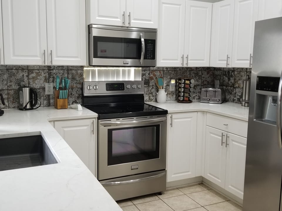 Comes with all the cookware, bakeware & small appliances you could need.