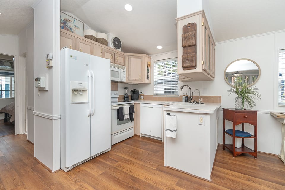 Full kitchen with oven and dishwasher