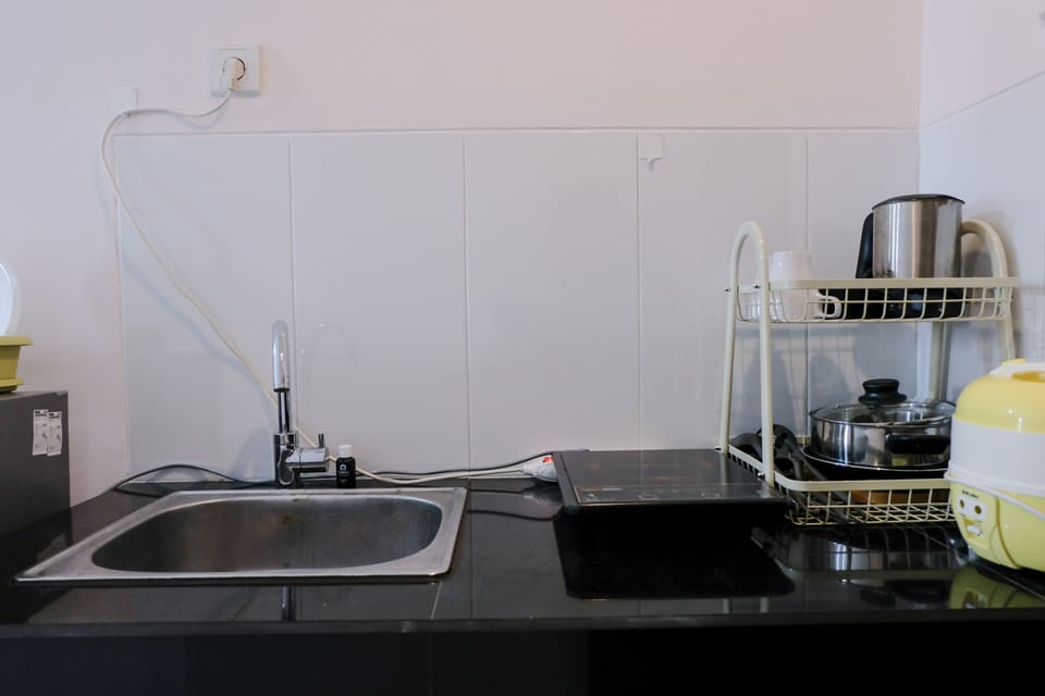 Apartment | Private kitchen | Full-size fridge, stovetop, rice cooker, cookware/dishes/utensils