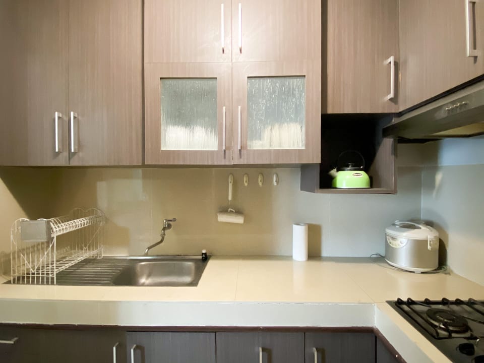 Apartment | Private kitchen | Full-size fridge, microwave, stovetop, rice cooker