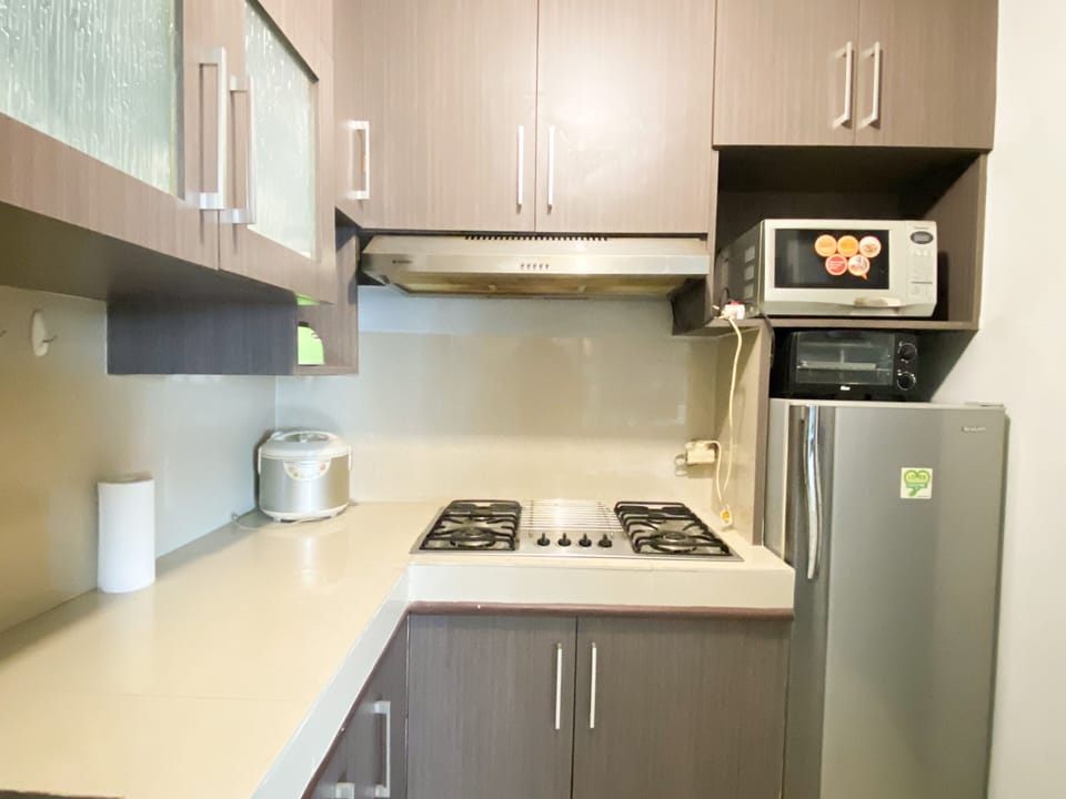 Apartment | Private kitchen | Full-size fridge, microwave, stovetop, rice cooker