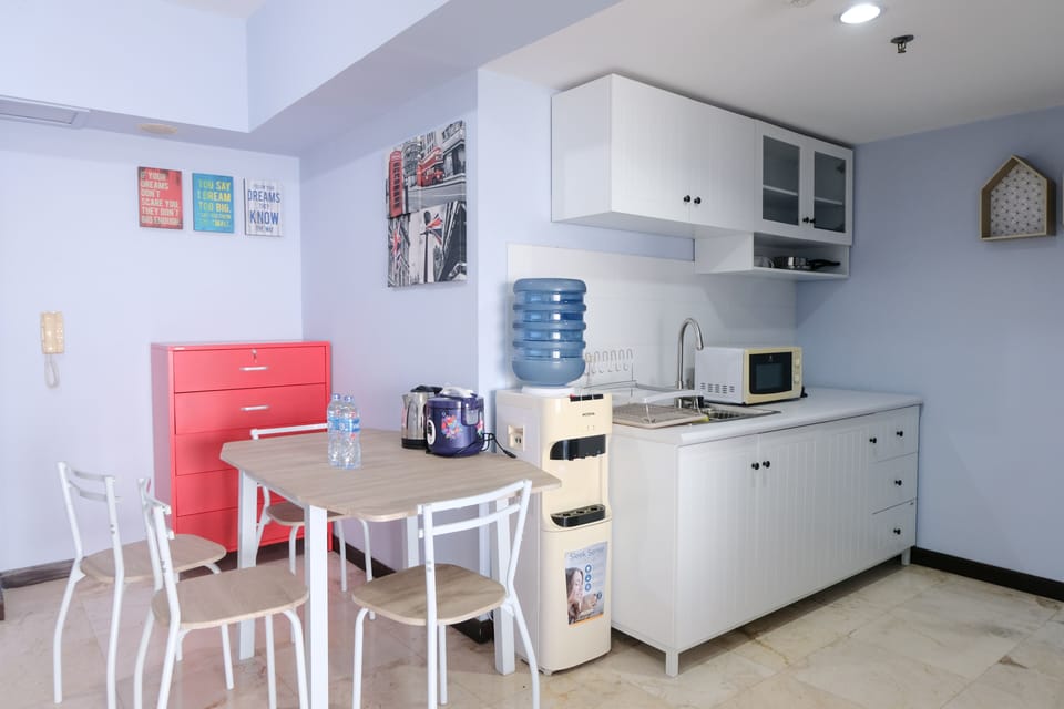 Apartment | Private kitchen | Full-size fridge, stovetop, rice cooker, cookware/dishes/utensils
