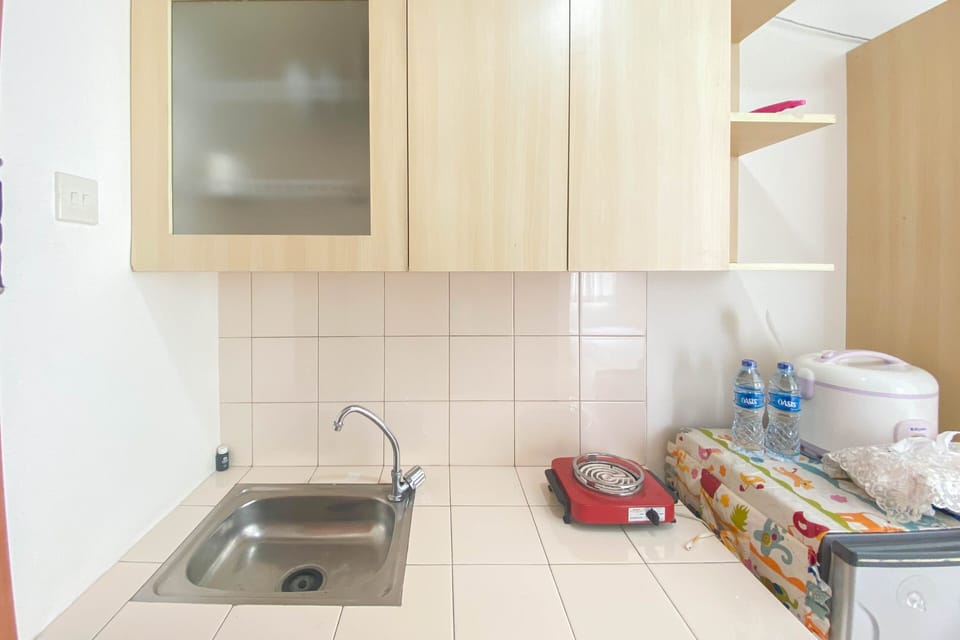 Apartment | Private kitchen | Full-size fridge, stovetop, rice cooker, cookware/dishes/utensils