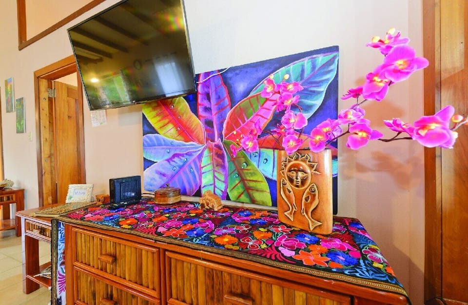 Local art & handcrafted furniture with Smart HD TV, streaming services & WiFi