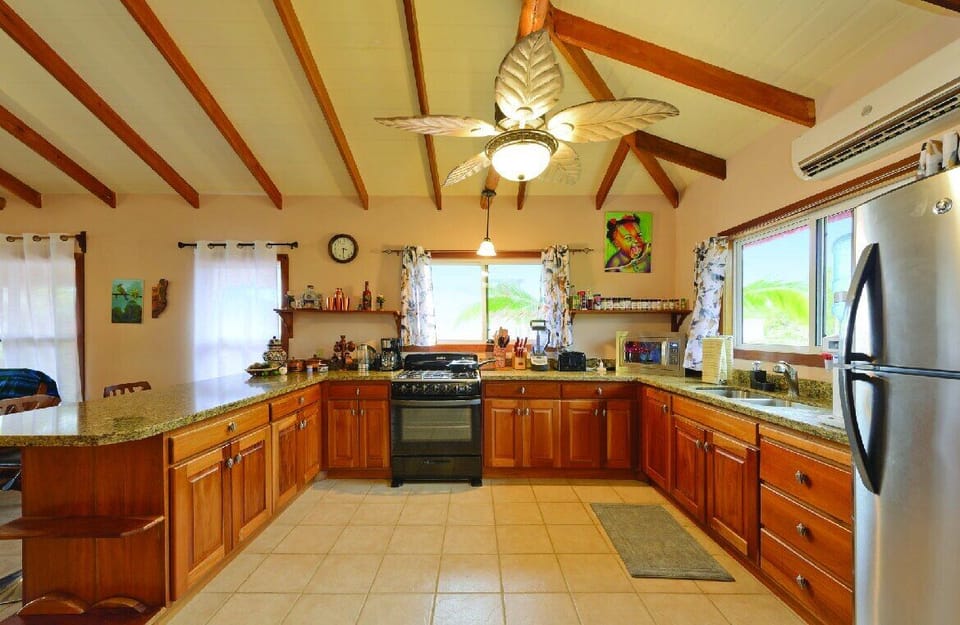 Fully stocked kitchen w/ every appliance & amenity. 5 gallons of drinking water.