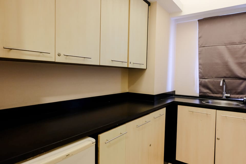 Apartment | Private kitchen | Full-size fridge, stovetop, rice cooker, cookware/dishes/utensils