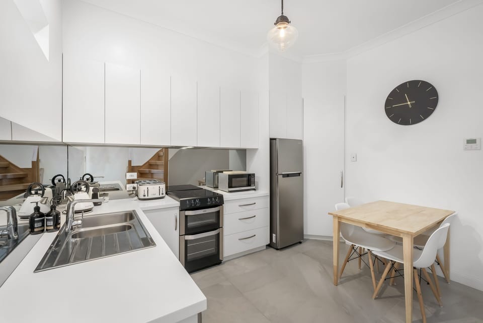 Design Apartment | Private kitchen | Full-size fridge, microwave, oven, stovetop