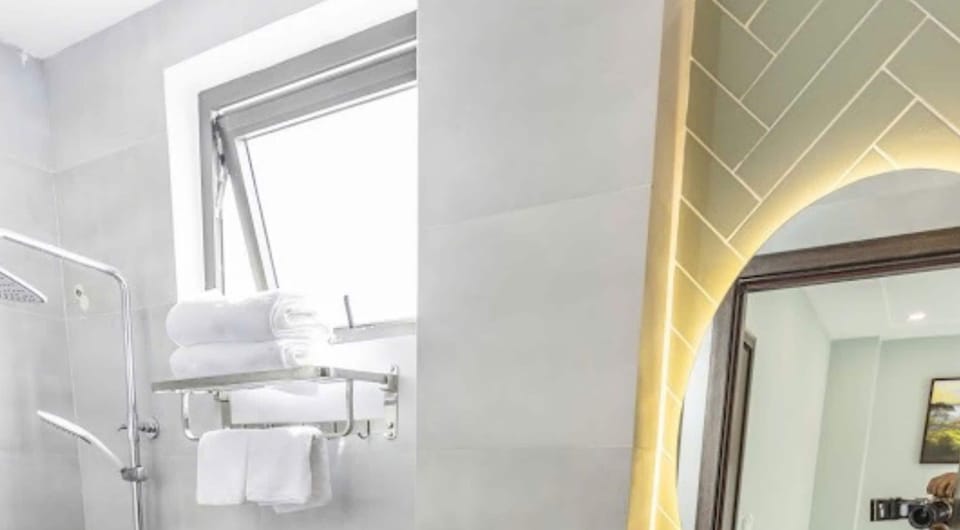 Family Studio | Bathroom | Shower, rainfall showerhead, designer toiletries, hair dryer