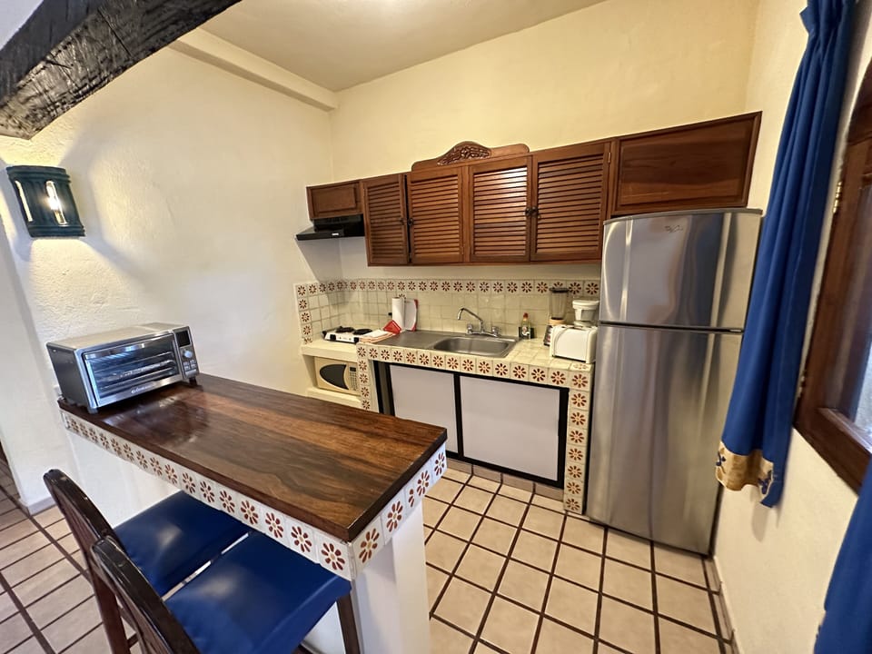 Full-size fridge, microwave, stovetop, toaster