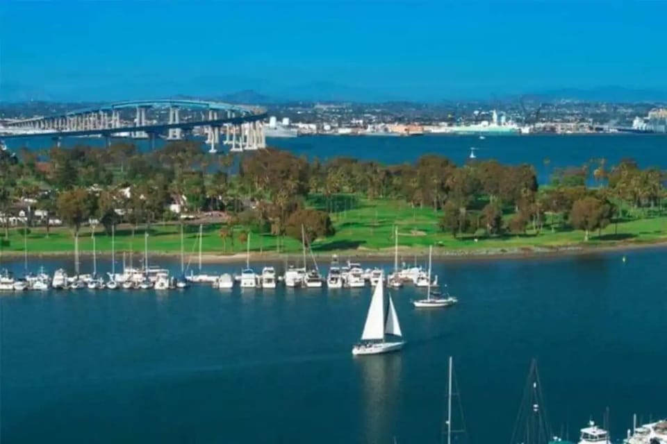 Stunning waterfront views of sailboats and the iconic bridge in the background. A serene, picturesque escape offering a peaceful ambiance with easy access to local attractions and outdoor adventures.