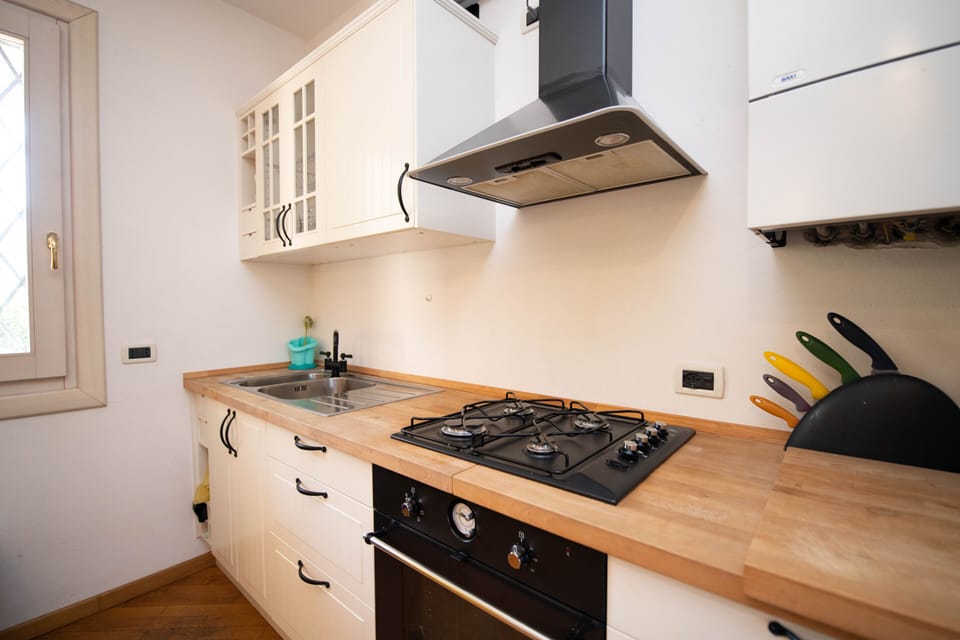 Comfort Apartment | Private kitchen | Full-size fridge, oven, coffee/tea maker, electric kettle