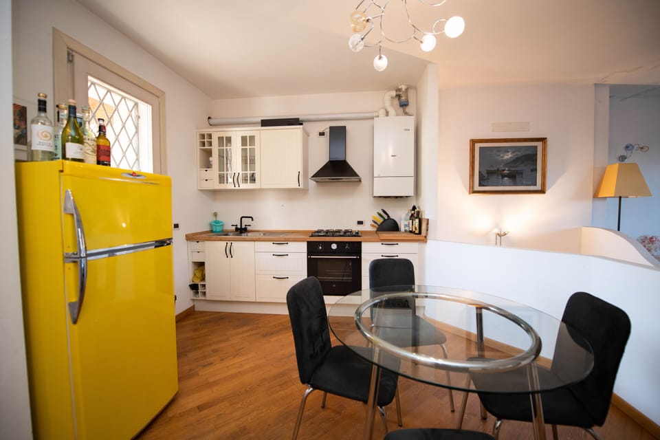 Comfort Apartment | Private kitchen | Full-size fridge, oven, coffee/tea maker, electric kettle