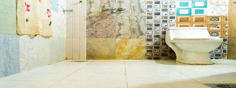 Shower, rainfall showerhead, towels, soap