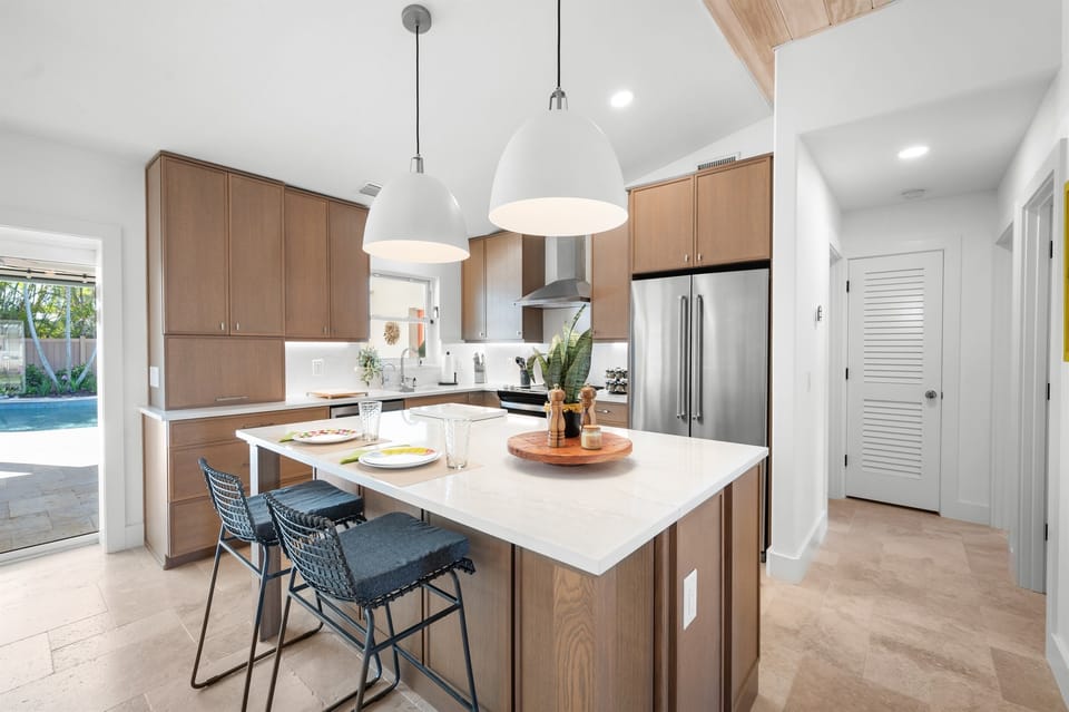 Open kitchen with easy access to dining and pool