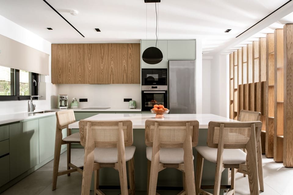 The fully equipped kitchen awaits to inspire culinary creations.