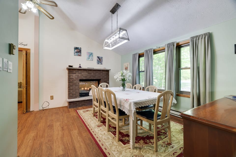 Dining room with seats for 8 and fireplace