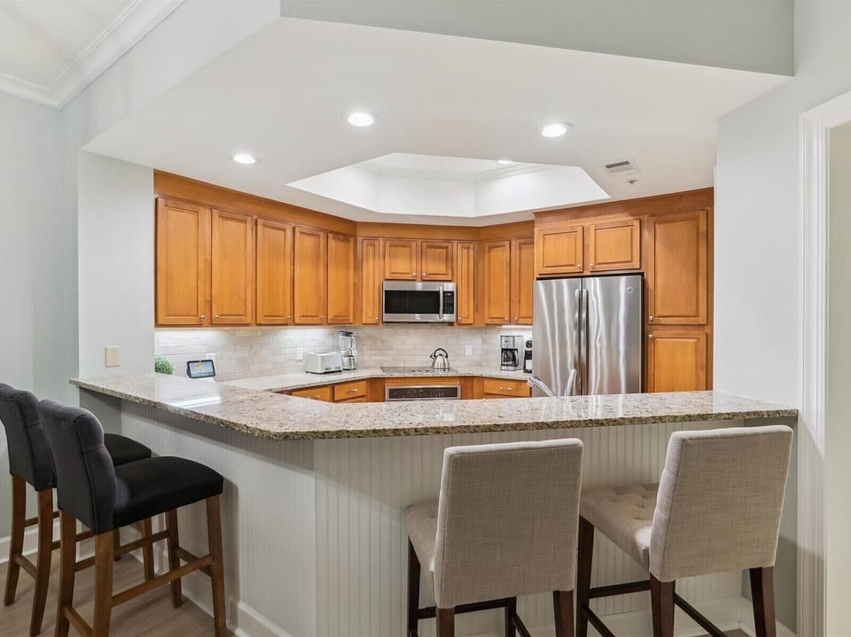 Kitchen with Breakfast Counter at 8131 Wendover Dunes