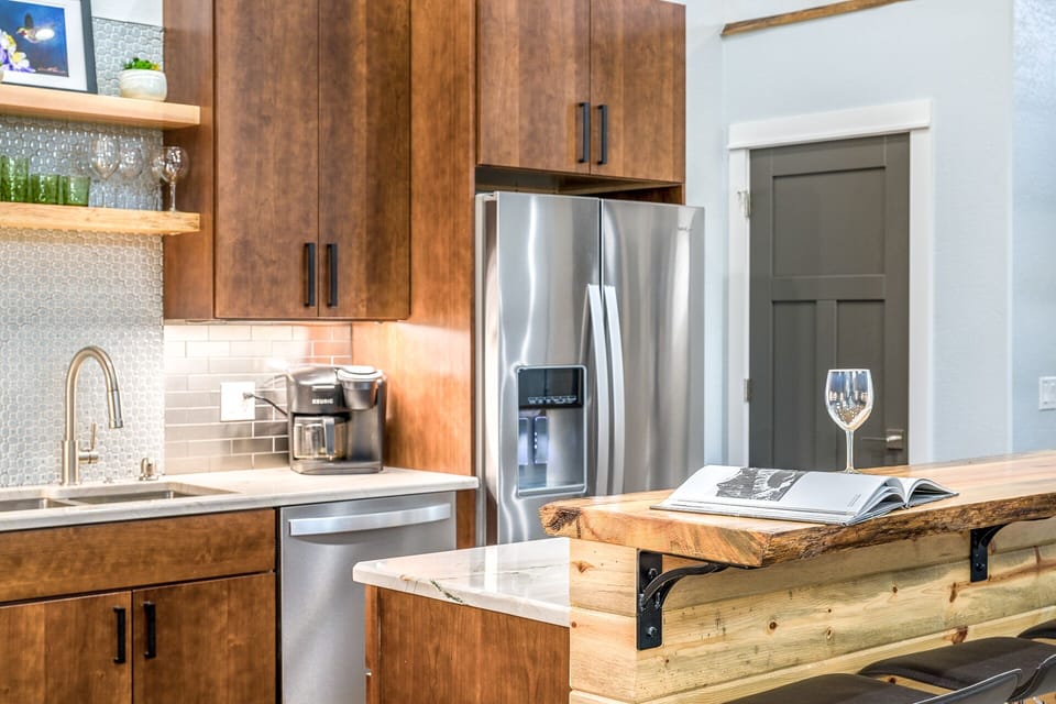 Pristine kitchen space with updated appliances for your stay