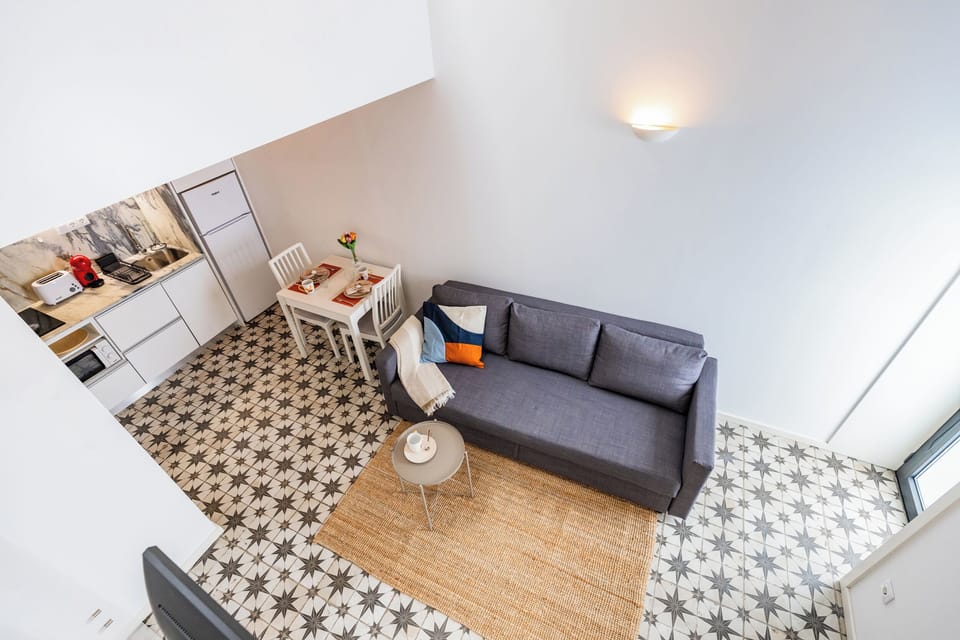 Comfort House | Living area | Flat-screen TV