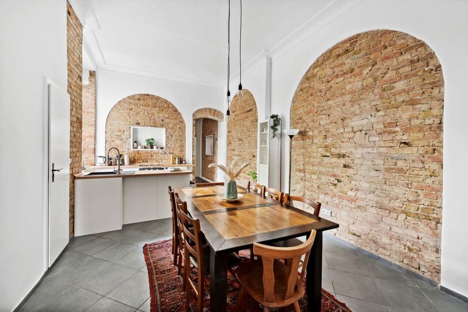 Cozy dining table and kitchen