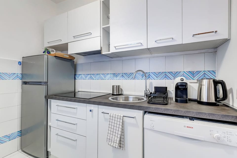 Fridge, hob and sink