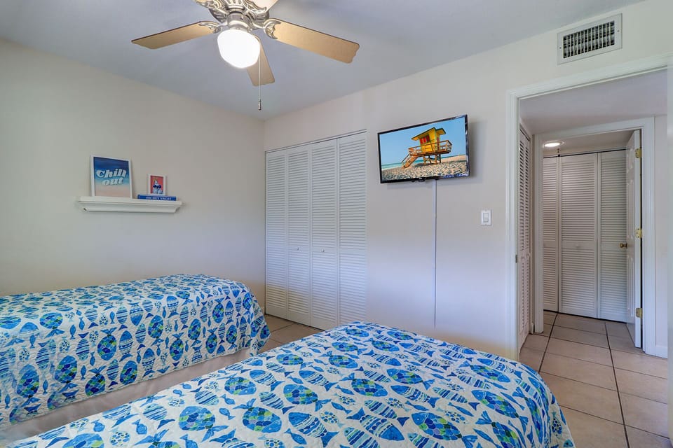 Twin bedroom with new Roku TV.