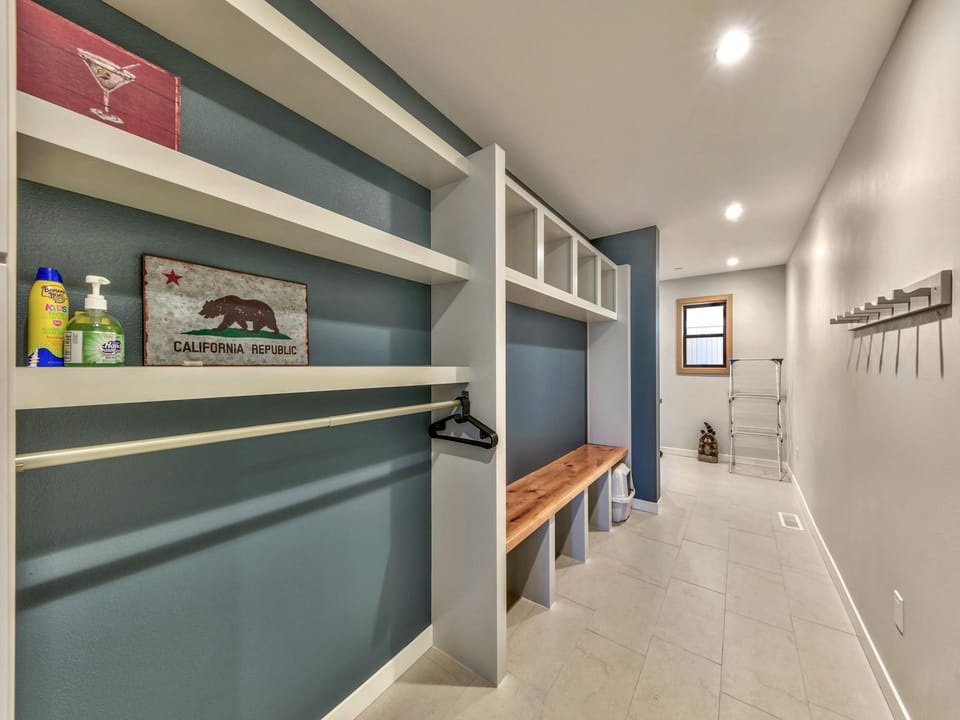 Large mudroom with washer dryer to store all your gear