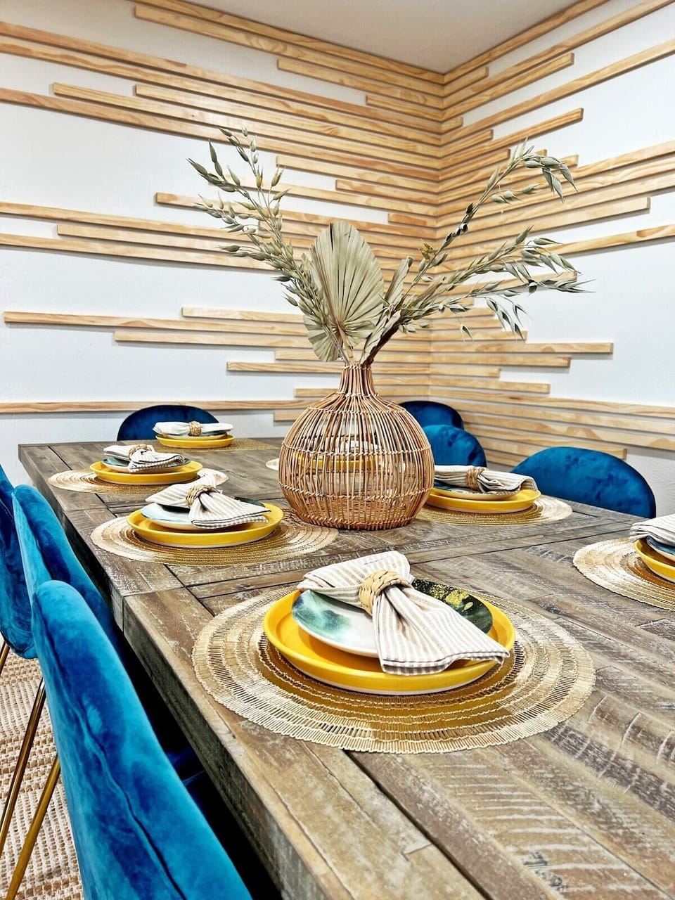 What more can you ask for in a dining area with this eye-catching centerpiece and well-prepared table setting.