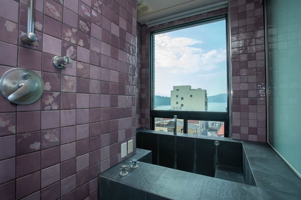 Standard Triple Room | Bathroom | Combined shower/tub, deep soaking tub, free toiletries, hair dryer