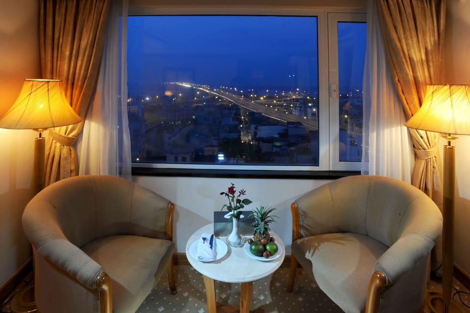 Deluxe Double Room, City View | Minibar, in-room safe, desk, blackout drapes