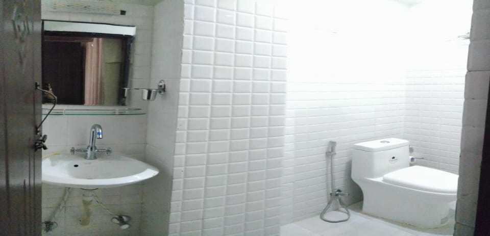 Shower, rainfall showerhead, towels, soap