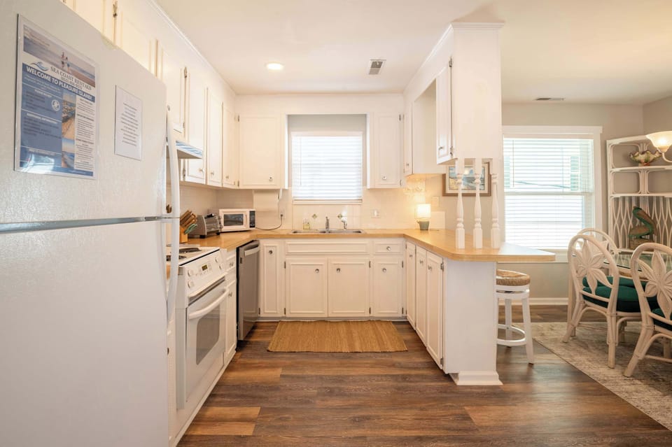 Cheerful Kitchen with everything you need for cooking at home.