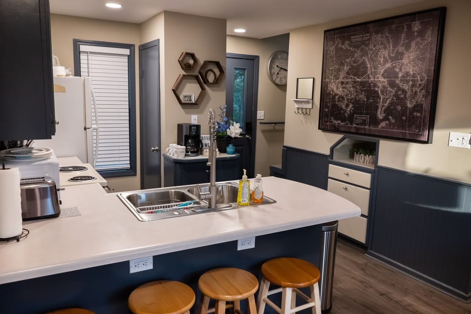 Full kitchen and stools for the bar
