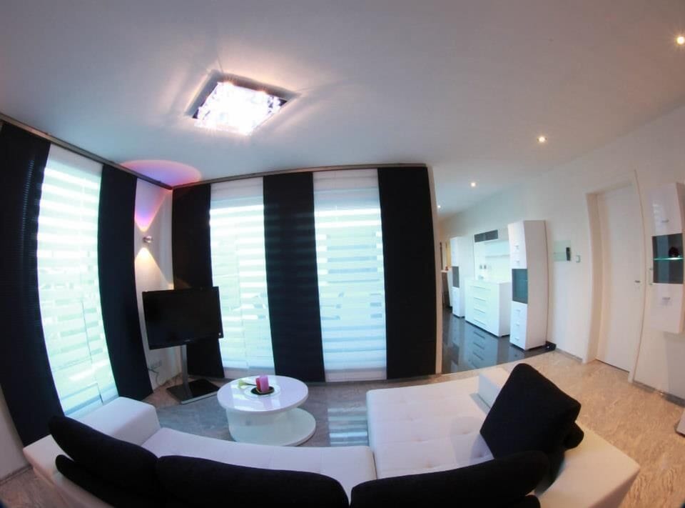 Deluxe Penthouse, 1 King Bed, Kitchenette | Living area | Flat-screen TV
