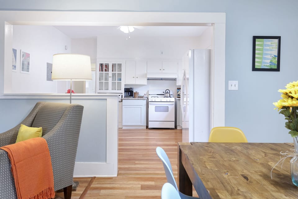 Through the dining room into the kitchen