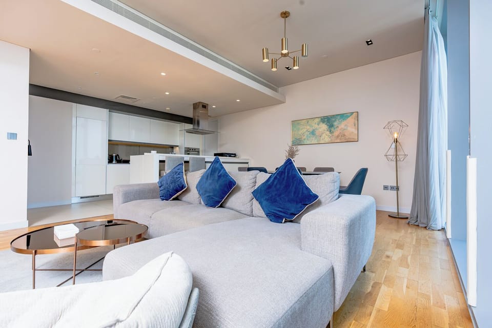 Deluxe Apartment | Living area | 55-inch Smart TV with cable channels, TV, Netflix