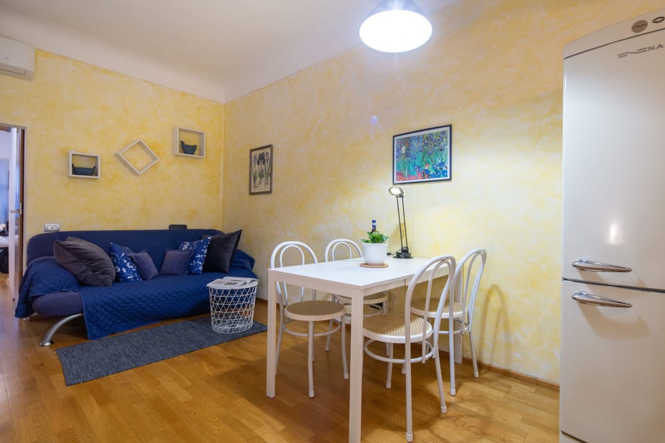 Comfort Apartment | Living area | 32-inch flat-screen TV with digital channels, TV