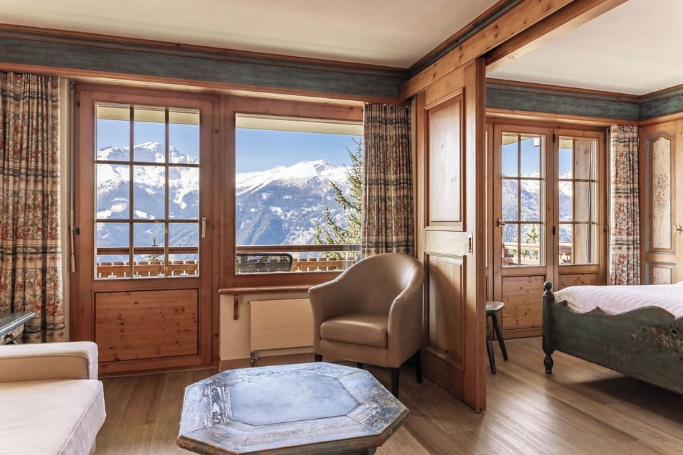 Deluxe Suite, Balcony, Mountain View | In-room safe, soundproofing, free WiFi, bed sheets