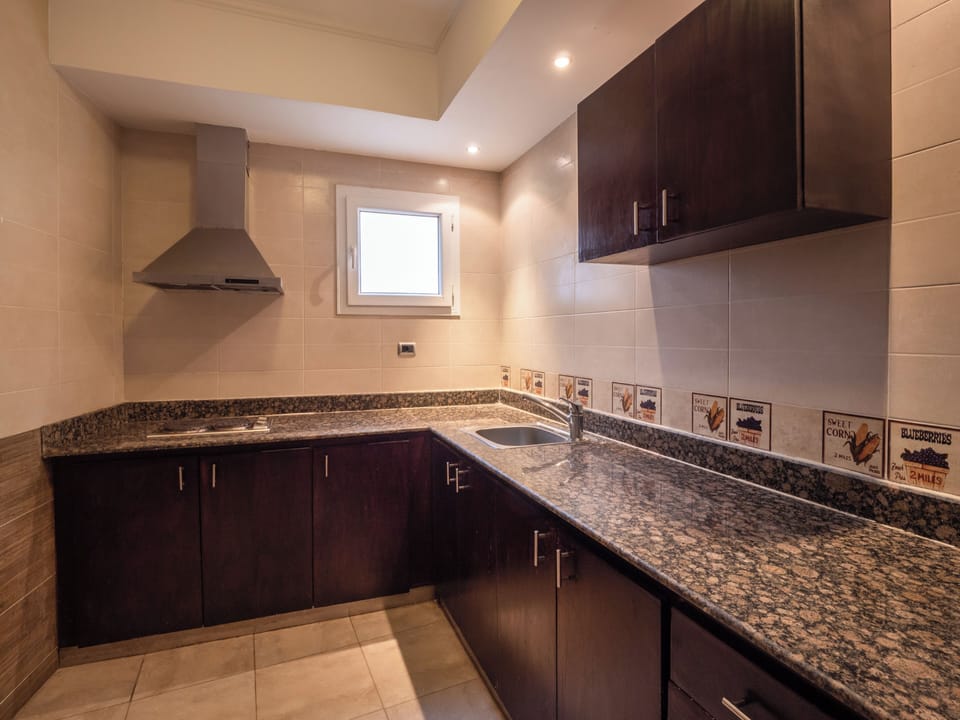 Family Apartment, 2 Bedrooms, Private Bathroom | Private kitchen | Fridge