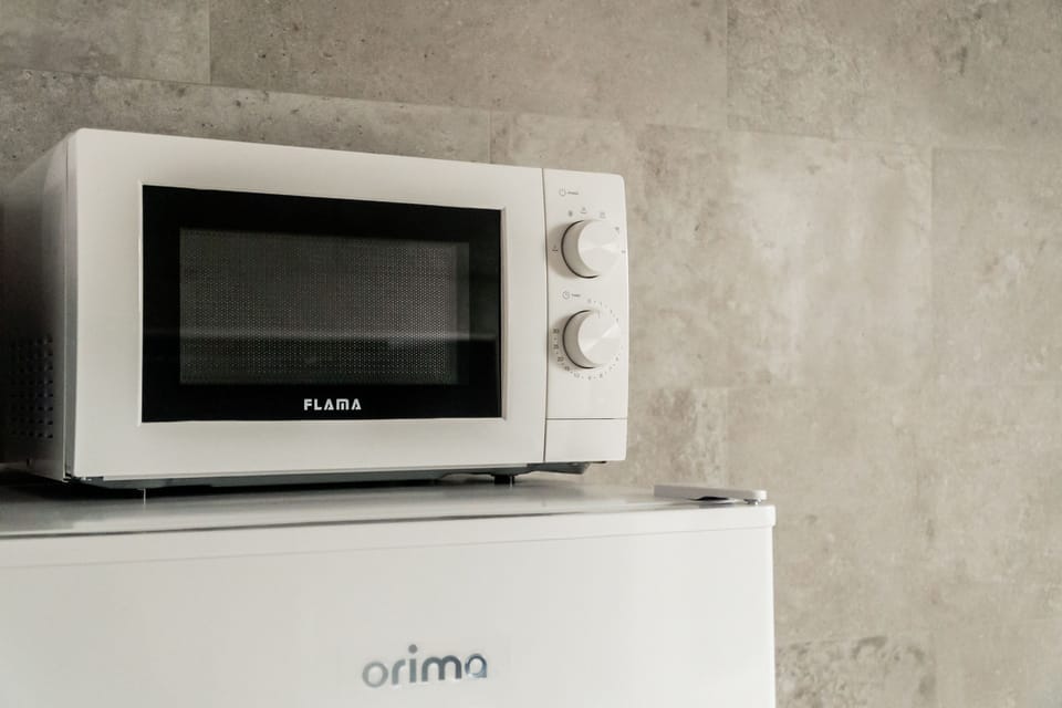 Full-size fridge, microwave, stovetop, electric kettle