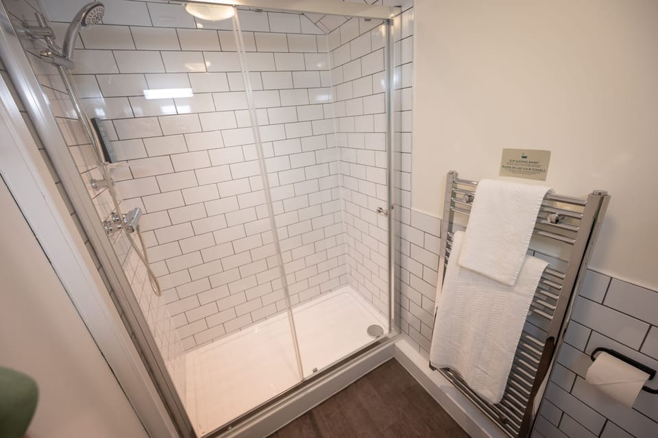 Family Room | Desk, blackout drapes, iron/ironing board, free WiFi