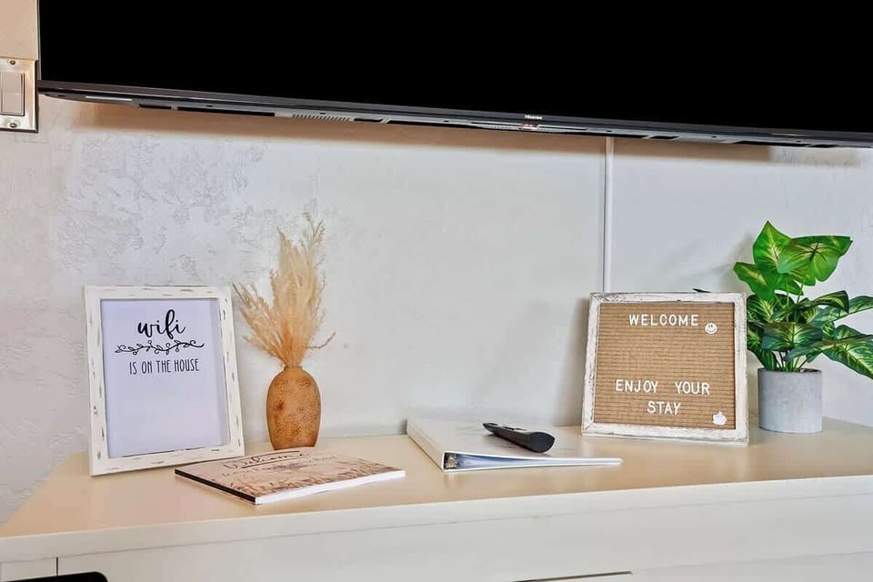 Welcome table on the TV credenza